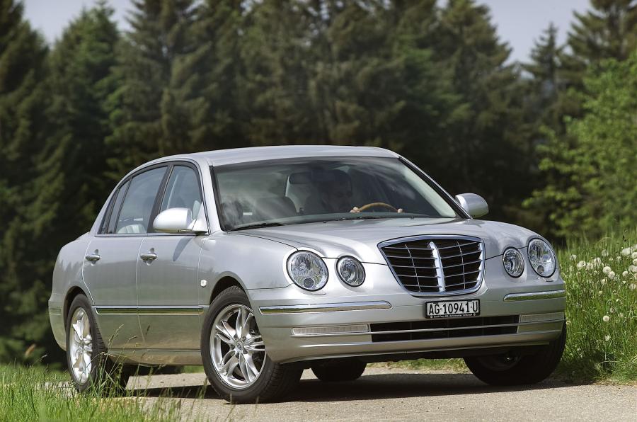  Kia Opirus 2003 года  (фото 38 из 54)